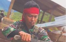 Momen Prajurit TNI Menari Pakai Mandau Dayak dan Senjata Laras Panjang Jadi Sorotan