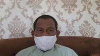 Ahmad Mokambu Warga Kabupaten Bone Bolango yang sembuh dari penyakit usai divaksin Covid-19 (Arfandi Ibrahim/Liputan6.com)