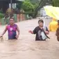 Banjir di Manado. Mengakibatkan korban meninggal dan ratusan orang mengungsi. (Foto: Dokumentasi BNPB).