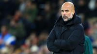 Pep Guardiola - Pelatih berkepala plontos ini telah mempersembahkan banyak trofi dan membawa Manchester City menjelma menjadi klub elit di Eropa. Menukangi City sejak Juli 2016 Pep telah memenangi 231 laga dari 312 pertandingan. (AFP/Lindsey Parnaby)