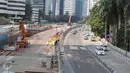 Suasana jalanan yang sepi kendaraan di Jakarta, Jumat (25/3). Menikmati libur panjang, Warga banyak yang menghabiskannya liburan ke luar kota Jakarta. (Liputan6.com/Angga Yuniar)