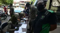 Lagi, Belasan Warga yang Tak Menggunakan Masker di Matraman Ditindak