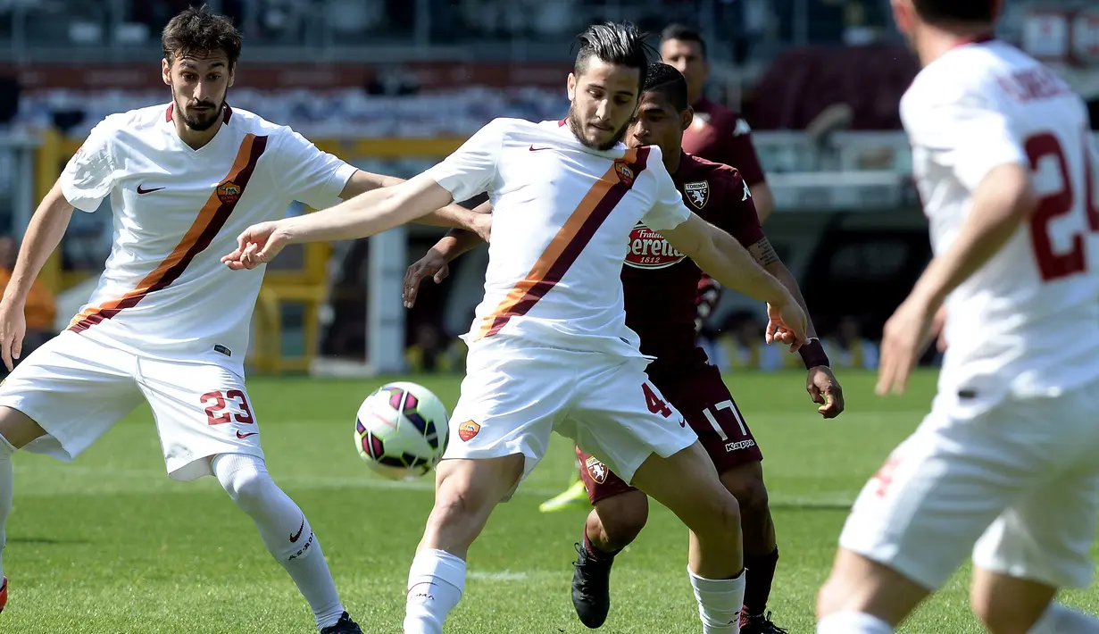 AS Roma kerepotan membongkar pertahanan Torino. Alhasil, I Lupi harus puas bermain sama kuat 0-0 di paruh pertama. (AP Photo/Massimo Pinca)