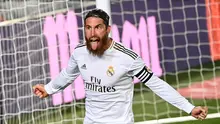 Bek Real Madrid, Sergio Ramos, merayakan gol yang dicetaknya ke gawang Getafe pada laga lanjutan La Liga pekan ke-33 di Stadion Alfredo Di Stefano, Jumat (3/7/2020) dini hari WIB. Real Madrid menang 1-0 atas Getafe. (AFP/Gabriel Bouys)
