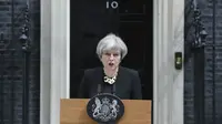 Perdana Menteri Inggris Theresa May saat memberikan keterangan terkait teror London. (Andrew Matthews/PA via AP)