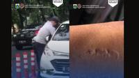 Tidak terima mobilnya diderek karena parkir liar, pria nekat ini berontak dengan mengigit lengan pertugas Dishub. (source: Indtagram @dishubjaksel)