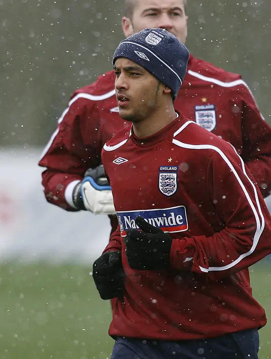 Theo Walcott  membuat 47 penampilan untuk Timnas Inggris. (AFP/Glyn Kirk)
