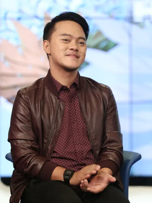 "Flashback, aku dari yang bukan siapa-siapa ya. Keahlian Indosiar cetak Danang seperti ini. Datang dari kampung, jadi tahu cara bernyanyi yang baik, berpenampilan juga," kata Danang di SCTV Tower, Senayan, Selasa (20/12). (Galih W. Satria/Bintang.com)