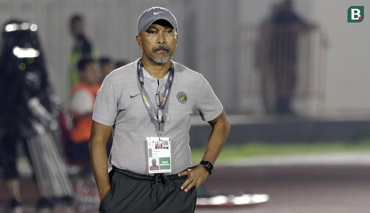 Pelatih Timnas Indonesia U-19, Fakhri Husaini (Bola.com/Yoppy Renato)
