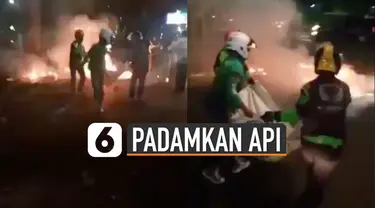 Mereka mengumpulkan tanah dan mematikan beberapa titik api.