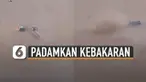Sebuah aksi keren dipertonton pengemudi mobil saat membantu memadamkan api mobil yang terbakar di padang pasir.