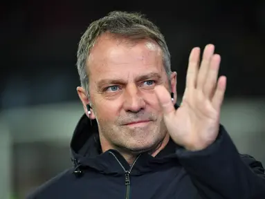 Hansi Flick hampir pasti akan jadi pindah ke Barcelona sebagai pengganti bagi Xavi Hernandez. (UWE KRAFT / AFP)