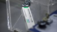 Sekotak vaksin COVID-19 terlihat saat proses produksi di bengkel pengemasan selama tur media di kantor pusat Sinopharm di Beijing pada 26 Februari 2021. The Beijing Institute of Biological Products mengembangkan vaksin corona dari virus yang sudah dilemahkan. (Noel Celis/AFP)
