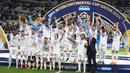 Real Madrid sukses menjuarai FIFA Intercontinental Cup 2024 usai mengalahkan Pachuca. Pertandingan digelar di Lusail Stadium, Kamis (19/12/2024) dini hari WIB. Los Blancos tampil dominan dengan kemenangan telak 3-0. (AP Photo/Hussein Sayed)