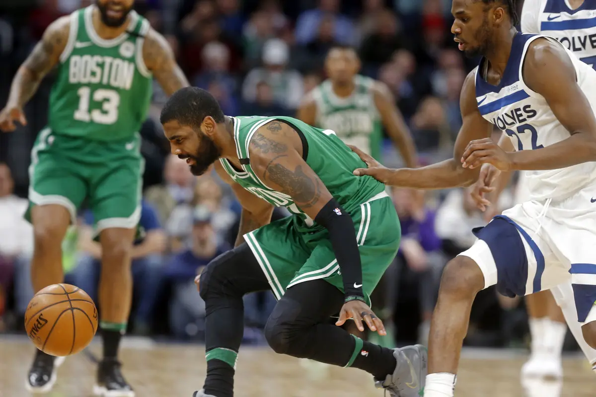 Aksi Kyrie Irving saat Celtics mengalahkan Timberwolves
