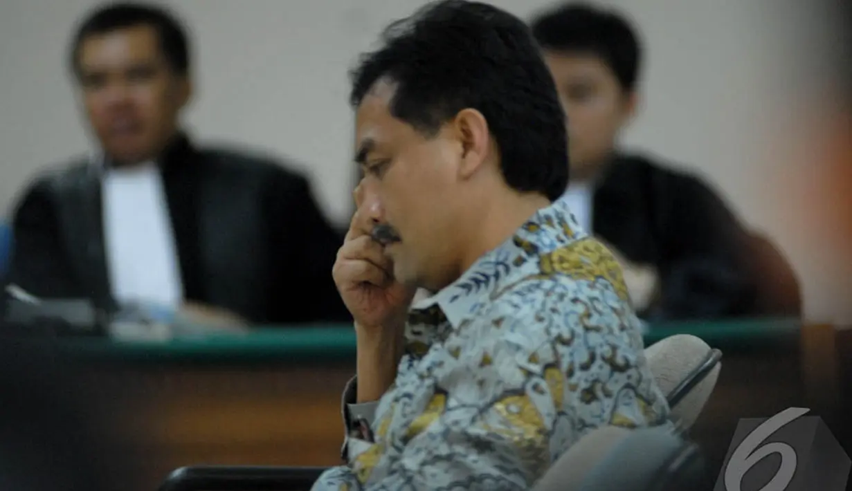 Andi Alfian Mallarangeng diduga terlibat korupsi pada proyek Pusat Pendidikan Pelatihan dan Sekolah Olah Raga Nasional (P3SON), Pengadilan Tipikor, Jakarta,  Senin (30/6/2014) (Liputan6.com/Miftahul Hayat)