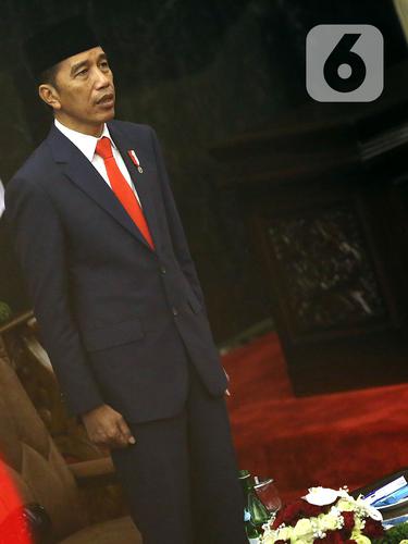 Joko Widodo atau Jokowi saat menghadiri pelantikannya sebagai Presiden RI periode 2019-2024 di Gedung Nusantara, Jakarta, Minggu (20/10/2019). Jokowi dan Ma'ruf Amin resmi dilantik sebagai Presiden dan Wakil Presiden RI periode 2019-2024. (Liputan6.com/JohanTallo)