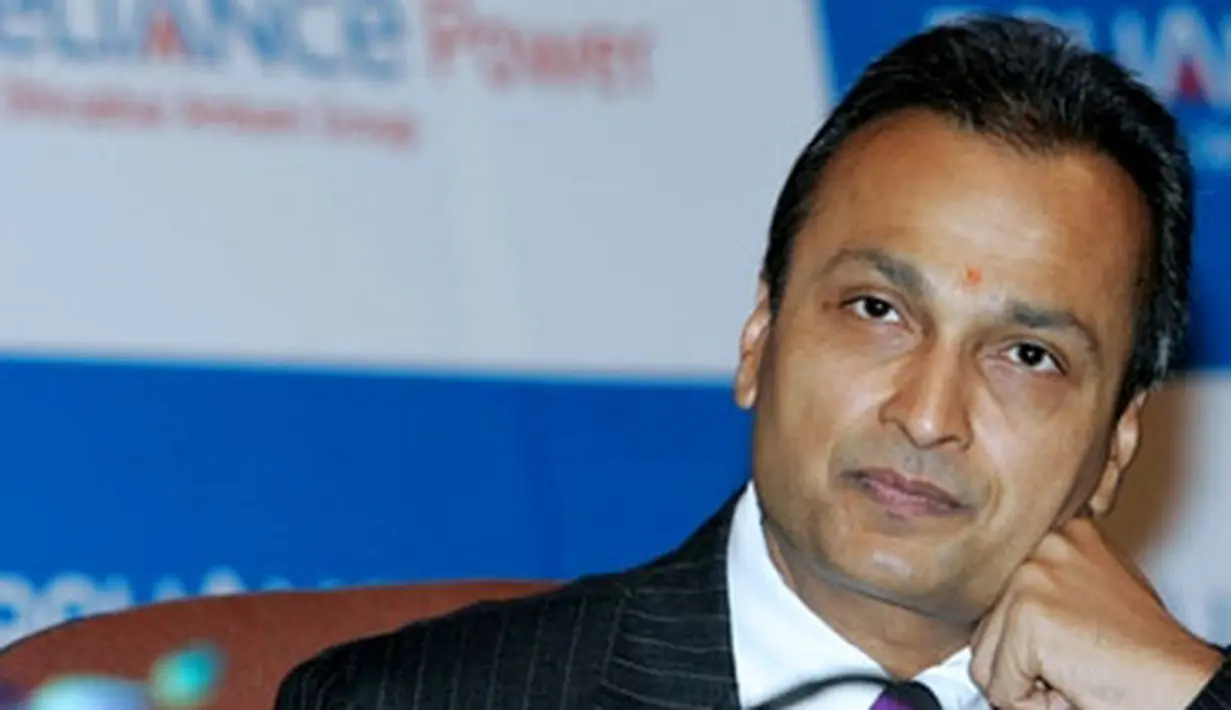 Chairman of India's Reliance Power Anil Ambani watches proceedings at a ceremony to mark the listing of the company at The Bombay Stock Exchange (BSE) in Mumbai on February 11, 2008. AFP PHOTO/Sajjad HUSSAIN