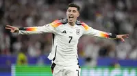 Kai Havertz saat ini bermain di Inggris bersama Arsenal. Performa apik Havertz membuat dirinya dipercaya membela Jerman di Euro 2024. Dia memiliki harga pasar yang mencapai 70 juta euro. (AP Photo/Matthias Schrader)