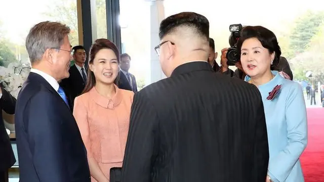 Kim Jong-un dan Ri Sol-ju (Foto: AFP)