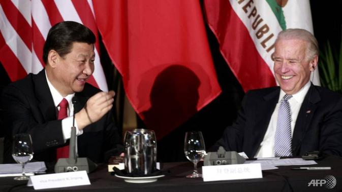 Joe Biden bertemu dengan Xi Jinping dari China di Los Angeles pada tahun 2012 ketika keduanya masih menjadi wakil presiden. (AFP / POOL)