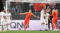 Timnas China menang 3-0 atas Filipina pada laga kedua Grup C Piala Asia 2019, di Mohammed bin Zayed Stadium, Abu Dhabi, Jumat (11/1/2019). (AFP/Khaled Desouki).
