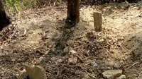 Warga Alian, Kebumen geger usai temuan gundukan tanah misterius mirip makam di pekarangan warga. (Foto: Liputan6.com/Humas Polres Kebumen)