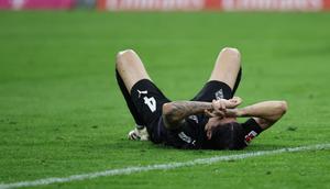 Bek Moenchengladbach berdarah Indonesia-Belanda bernomor punggung 04, Kevin Diks, bereaksi selama pertandingan Bundesliga divisi pertama Jerman antara Bayern Munchen dan Borussia Moenchengladbach di Munich, Jerman selatan, Sabtu (7-3-2026) dini hari WIB. (Alexandra BEIER/AFP)