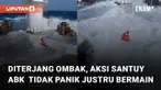 Sebuah kapal diterjang ombak di tengah laut mengundang perhatian