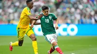 Gelandang Timnas Meksiko, Gilberto Mora, menyandang status sebagai pemain termuda di Piala Dunia 2026. Mora turut tampil ketika Meksiko menang 2-0 atas Afrika Selatan pada laga pembuka Piala Dunia tahun ini di Mexico City Stadium, Jumat (12/06/2026) dini hari WIB. (AP Photo/Natacha Pisarenko)