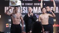 Pertandingan paling ditunggu pada Byon Combat Showbiz Volume 4 antara Rudy Golden Boy Vs Dean Hamsah. (Muhammad Iqbal Ichsan/Bola.com)