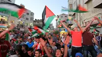 Pesta Rakyat Palestina (ABBAS MOMANI / AFP)