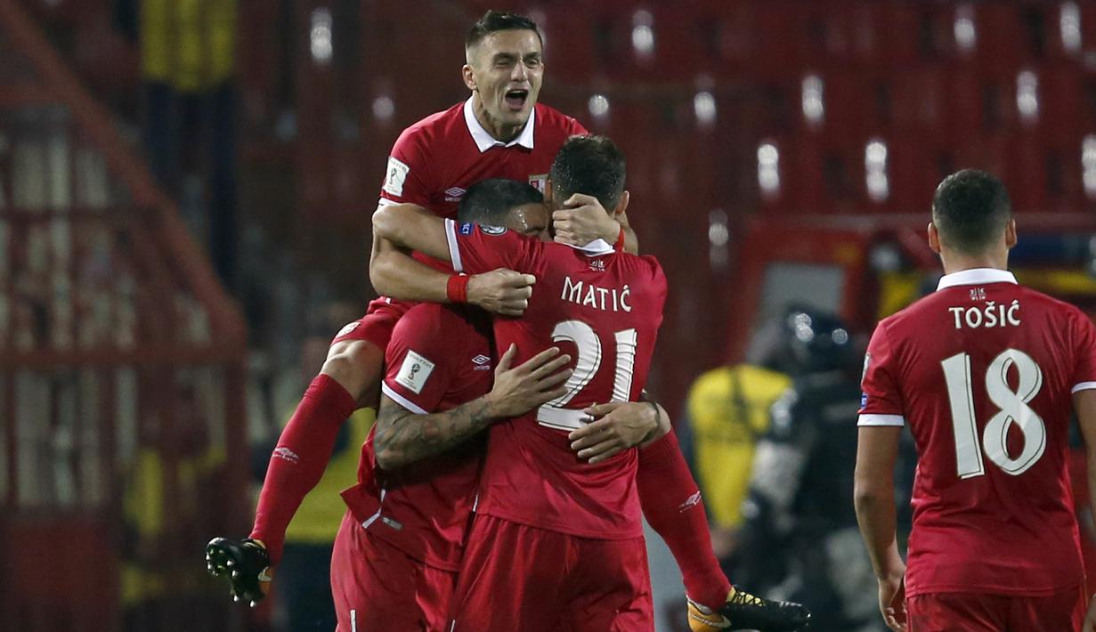 Serbia lolos ke putaran final Piala Dunia 2018 setelah kukuh di puncak klasemen grup D dengan total 21 poin. (AP/Darko Vojinovic)