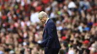Pelatih Arsenal, Arsene Wenger, menyatakan akan meninggalkan Emirates Stadium pada akhir musim 2017-2018. (AP/John Walton)