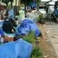 Pengungsi Somalia menelantar di trotoar jalan di depan Rumah Detensi Imigrasi, Kalideres, Jakarta Barat (4/4/2018) (Rizki Akbar Hasan/Liputan6.com)