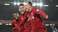 Gelandang Liverpool, Xherdan Shaqiri, merayakan gol yang dicetaknya ke gawang Mnachester United pada laga Premier League di Stadion Anfield, Liverpool, Minggu (16/12). Liverpool menang 3-1 atas MU. (AFP/Paul Ellis)