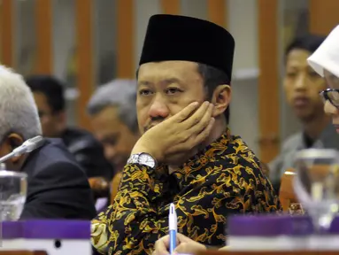 Ketua Komisi Yudisial (KY), Aidul Fitriciada Azhari saat mengikuti rapat koordinasi (Rakor) dengan Badan Legislasi (Baleg) DPR di Kompleks Parlemen, Jakarta, Selasa (24/5). Rapat tersebut membahas mengenai RUU Jabatan Hakim. (Liputan6.com/Johan Tallo)