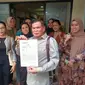 Sejumlah korban penipuan investasi arisan bodong saat melapor ke Polres Metro Depok. (istimewa)