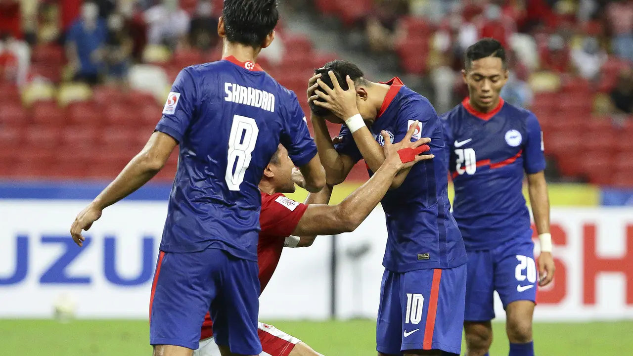 Foto: Melihat Aksi Kapten Asnawi Mangkualam saat Timnas Indonesia Indonesia Singkirkan Singapura di Leg Kedua Semifinal Piala AFF 2020