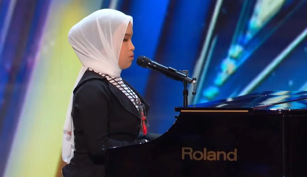 Membawakan lagu ciptaannya sendiri sambil bermain piano yang berjudul ‘Loneliness’ dan lagu Elton John berjudul ‘Sorry Seems to Be the Hardest World’, Putri Ariani mengguncang panggung AGT 2023.