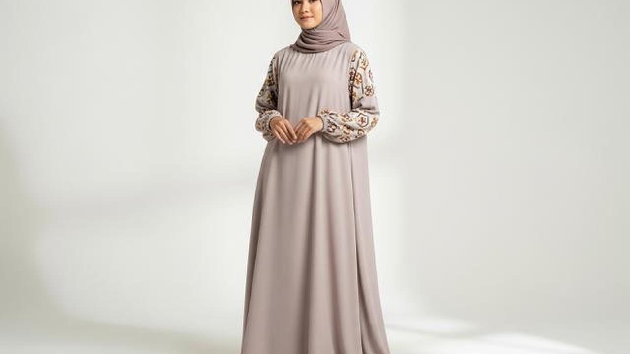 Gamis Tunik dengan Sentuhan Motif Etnik Modern/Model Gamis Tunik Ala Gen Z untuk Ramadhan 2026 (Sumber; gemini.com)