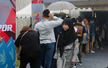 FOTO: Rayakan Hari Jadi Imigrasi ke-74, Antrean 1.074 Pemohon Paspor Pecahkan Rekor saat Car Free Day Jakarta
