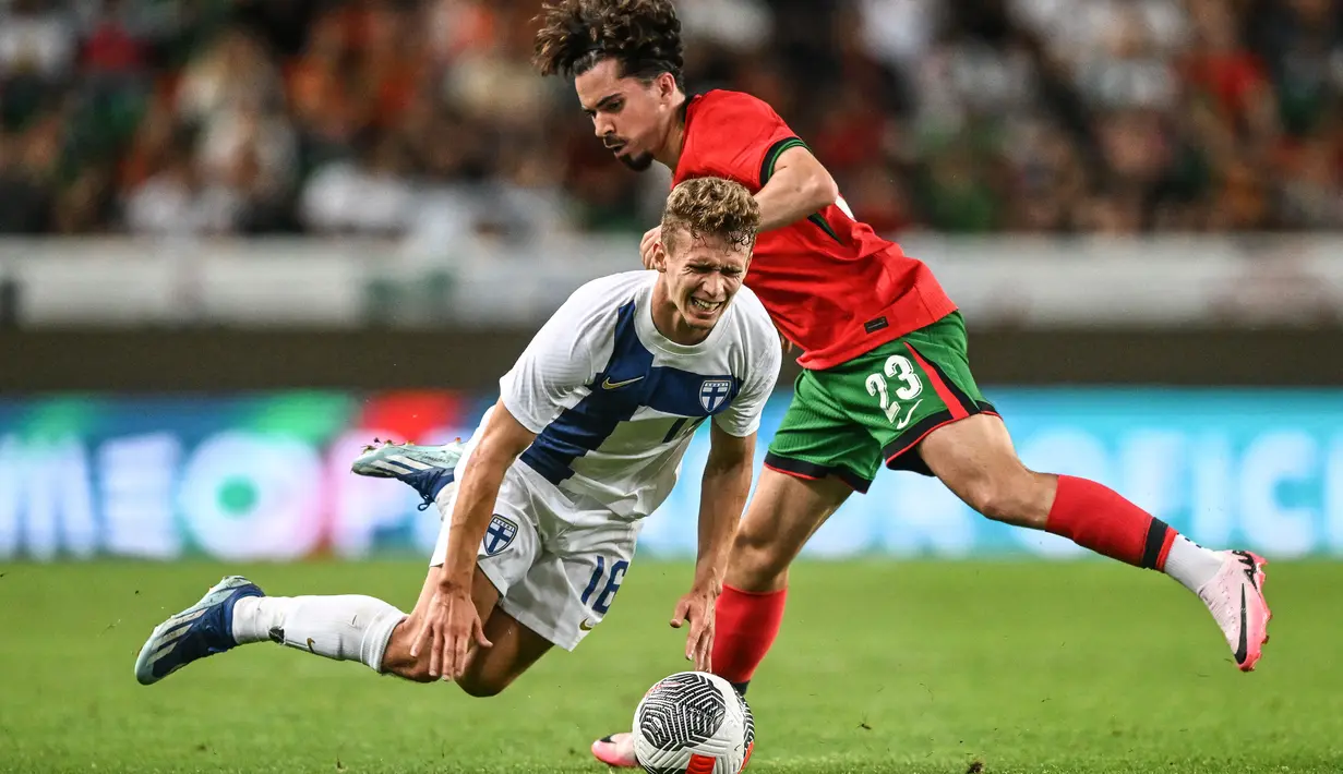 Megabintang Portugal Cristiano Ronaldo absen di pertandingan ini. (PATRICIA DE MELO MOREIRA / AFP)