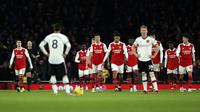 Reaksi pada pemain Manchester United setelah Bukayo Saka mencetak gol kedua Arsenal dalam pertandingan Liga Inggris di Emirates Stadium, London, Minggu, 22 Januari 2023. MU kalah 2-3 dari Arsenal.&nbsp;(AP Photo/Ian Walton)