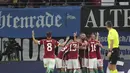 Para pemain Hungaria melakukan selebrasi setelah Adam Szalai mencetak gol pembuka timnya ke gawang Jerman dalam pertandingan UEFA Nations League di Red Bull Arena di Leipzig, Jerman, Jumat, 23 September 2022. Hungaria menang atas Jerman 1-0. (AP Photo/Michael Sohn)