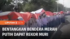 Bendera Merah Putih sepanjang lebih dari 3.000 meter dibentangkan oleh ribuan orang di atas Jembatan Suramadu, Jawa Timur. Kegiatan dalam rangka menyambut Hari Pahlawan tersebut, juga pecahkan rekor MURI.