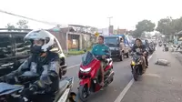 Antrian kendaraan pemudik di jalur mudik nasional Limbangan-Malangbong, Garut beberapa waktu lalu berlangsung lancar. (Liputan6.com/Jayadi Supriadin)