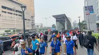 Para partisipan yang mengikuti peluncuran "Enjoy Jakarta Walking Tour" pada Jumat (11/10/2019) yang dilaksanakan dengan berjalan dari Gedung Sarinah hingga Terowongan Kendal, Jakarta Pusat. (dok. Liputan6.com/Novi Thedora)