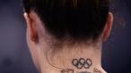 Vanessa Ferrari - Atlet Itali tersebut membuat tato lambang Olimpiade sebagai bentuk apresiasi dirinya yang telah mengikuti beberapa kali Olimpiade seperti di Beijing, London, dan Rio. (Foto: AFP/Loic Venance)