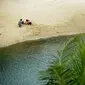 Pantai Palawan di Santosa Island, Singapura. (dok. ROSLAN RAHMAN / AFP)